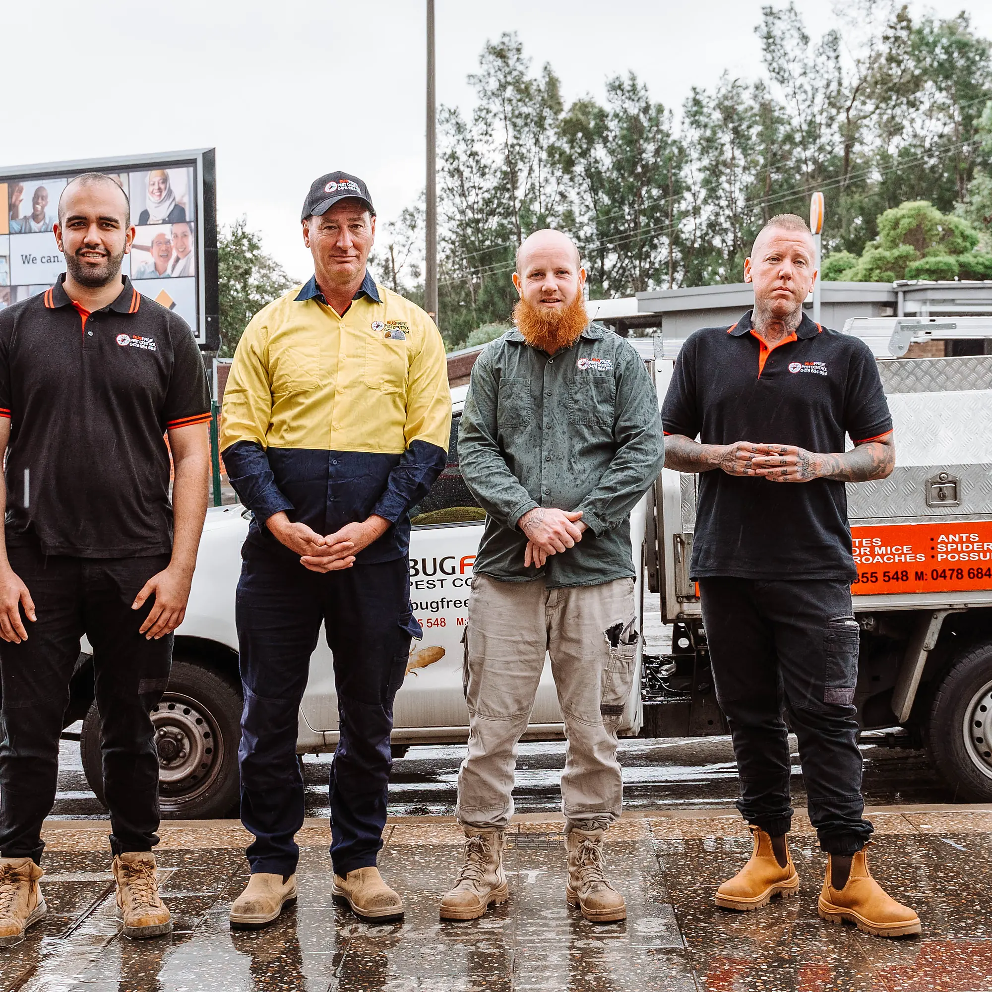 The Bug Free pest control team in front of their branded Sydney service vehicle